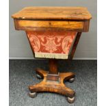 A 19th century rosewood games table.