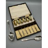 A Box set of 6 Birmingham silver tea spoons, Bullet style ends and gilt finish. Together with two