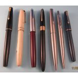 7 pens including Parker, Mabie Todd ?Swan?, Sheaffer Snorkel. 4 with 14 carat gold nibs