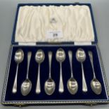 A box set of eight Birmingham silver tea spoons within a Hamilton & Inches box.