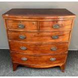 A 19th century Georgian mahogany two over three chest of drawers [101x90x52cm]