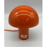 A Contemporary orange mushroom touch lamp.