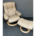 An Ekornes Stressless leather relaxer chair and foot stool.