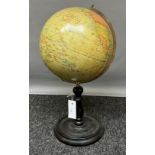 An Antique/ vintage 'Geographia' 10inch Terrestrial Globe on turned wooden stand. [46cm high, 25cm