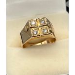 A Gold gents four diamond stone ring. Stamped 14. [6.25grams] [Ring size- R]
