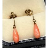 A Pair of 9ct yellow gold and coral earrings.