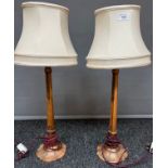 A Pair of antique hand carved table lamps, Showing carved English rose to the base and shaft. [