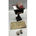 A Miniature bible pedestal stand and bible, bible comes with small magnifying glass. Together with