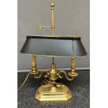 A Brass antique style desk lamp. [63cm high]