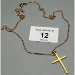 18ct yellow gold cross pendant with a 9ct yellow gold chain. [4.58grams] [48cm in length]