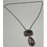 Antique possible gold suffragette style pendant with fitted necklace. Pendant consists of two