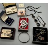 A Collection of silver jewellery to include earrings, pendant, necklace and bracelet set, Garnet and