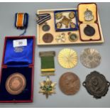 A Selection of medals, coins and medallions. Includes St. Christopher plaque, 1897 Victoria
