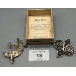 A Lot of two vintage Ola Gorie silver brooches. Comes with a certificate.