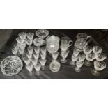 A Quantity of crystal glasses, bowl, preserve pot with lid and water jug etc