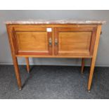 19th century wash stand with marble top, raised on square tapered legs ending in castor feet [