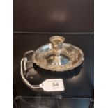A London Import silver ornate candle holder. [79.51grams] [5cm high, 11cm diameter]