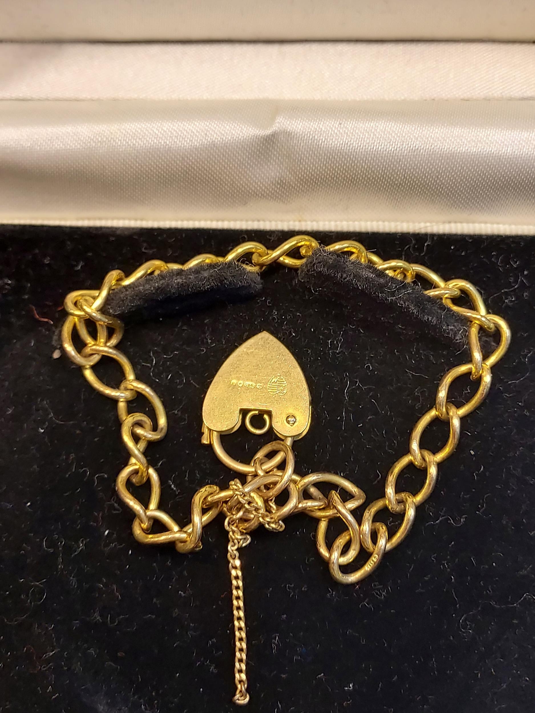 A 9ct yellow gold ladies belcher bracelet with a heart shaped locket. [8.20grams] [18cm length] - Image 2 of 2