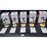 A Lot of five Royal Doulton Disney figures, comes with certificates and boxes. Includes Mickey and