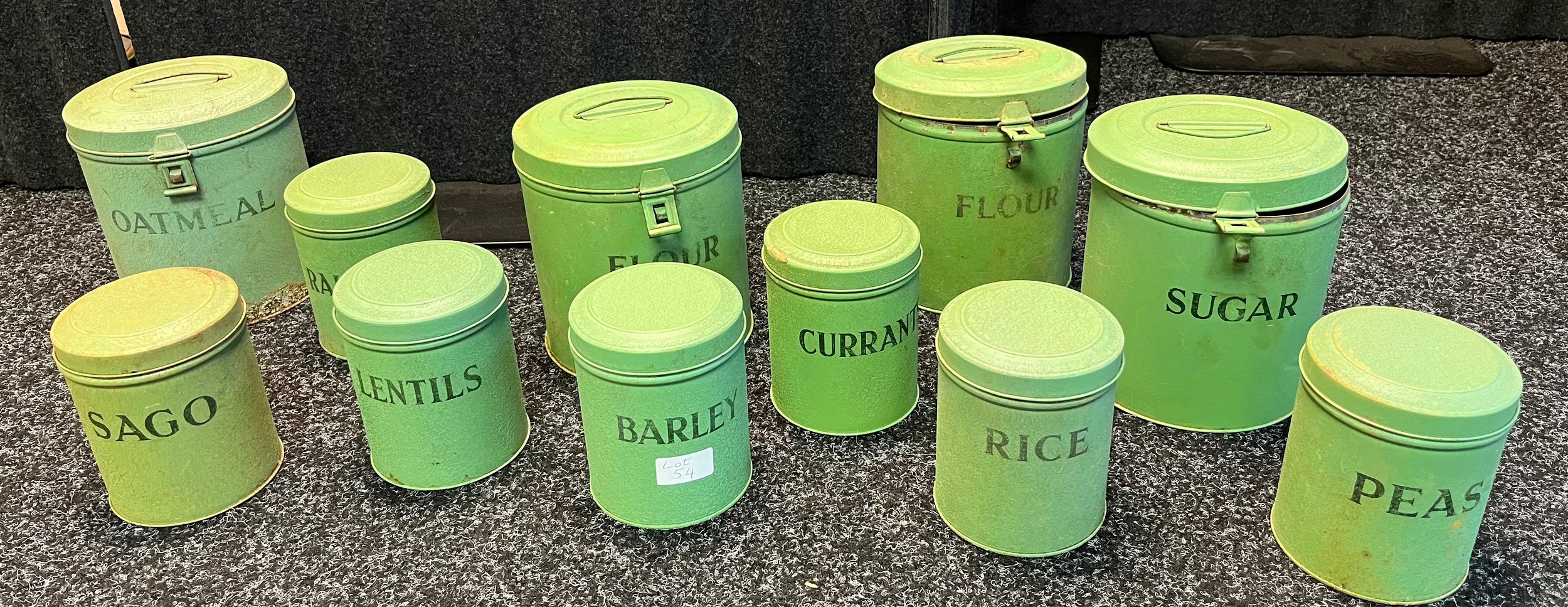 A Collection of vintage Tala green kitchen preserve tins. [One as found]