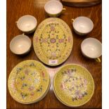 A Chinese yellow ground 5 piece setting tea set. Comes with oval cake plate.