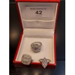 A Lot of three 925 silver ladies rings set with white glass stones. [Ring size I & K]