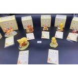 A Lot of seven Royal Doulton Winnie the Pooh figures, titled 'Patient Bear, Happy Birthday, Rum