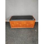 A Mid century teak and faux leather ottoman [48x100x42cm]