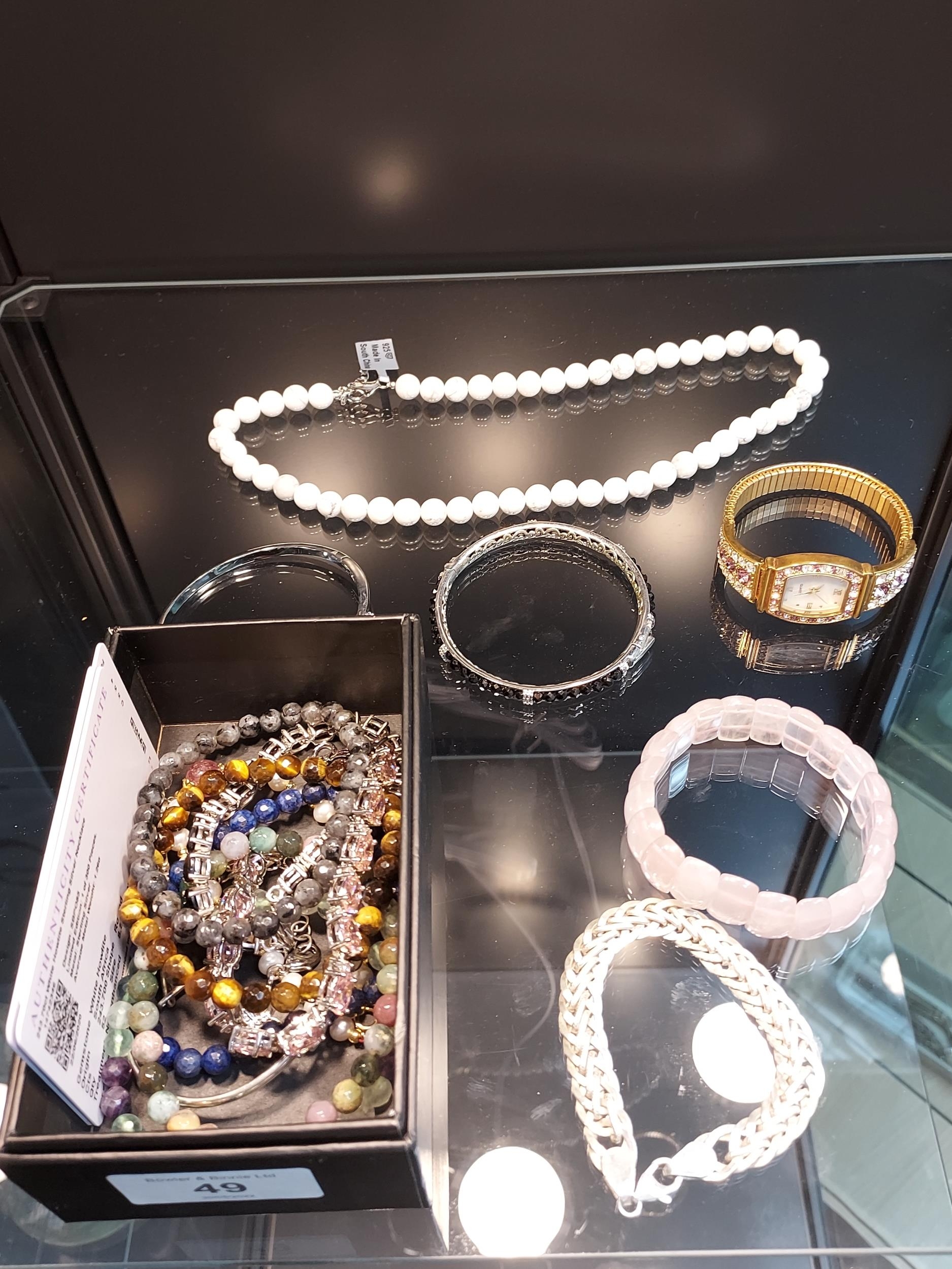 A Quantity of 925 silver and costume jewellery necklace, bracelets and bangles. Includes 925 link