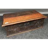 A 17th/ 18th century carved oak bible box [22x69x39cm]