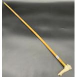 A 19th century Malacca and Ivory top walking cane.