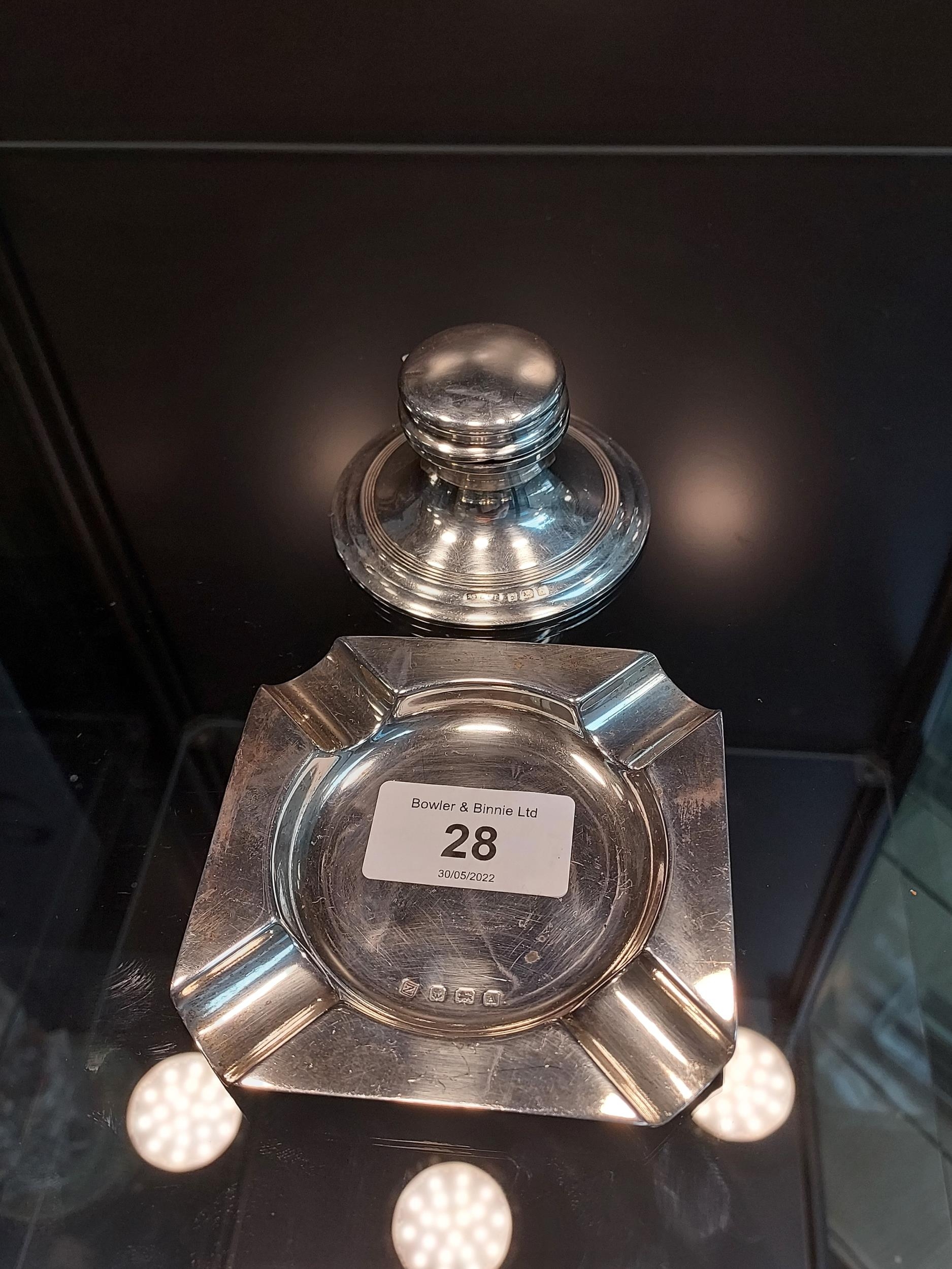 A Birmingham silver ash tray together with a Birmingham silver ink well pot.