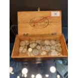 A Box containing a quantity of 18th, 19th and 20th century silver coins. Includes George III 1762
