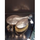 A Birmingham silver hand mirror and brush together with a Chester silver napkin ring