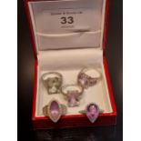 A Lot of five ladies 925 silver rings. Four 925 silver and Amethyst stone set rings [Ring size J &