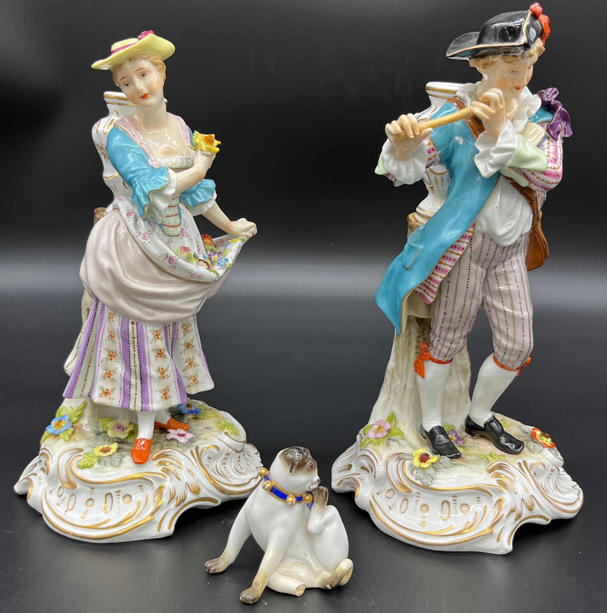 A Large pair of antique Meissen style figures, Together with a small Meissen pug dog. [As Found][