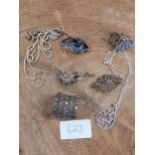 A Selection of silver jewellery items to include brooches and necklaces