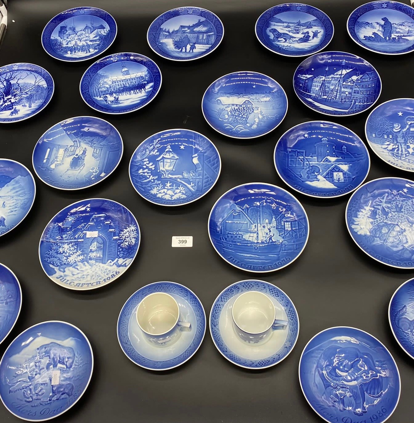A Collection of Copenhagen blue and white collectors plate, cups and saucers.