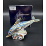 A Royal Crown Derby Stripe Dolphin paperweight, gold button and comes with original box.