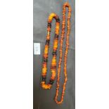 Two amber necklaces.