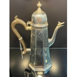 A Sheffield silver coffee pot. [465grams] [22cm high]