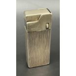 A Vintage Sterling silver cased lighter