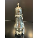 An Edinburgh silver sugar shaker produced by Hamilton & Inches [15cm high] [121.76grams]