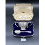 An Edinburgh silver two handle sugar bowl and spoon. Comes with a fitted box. Produced by James