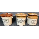 Three antique stone ware lidded preserve pots. 'Butter cup Dairy Co, Lipton & The professional &