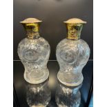 A Pair of London silver gilt topped and cut crystal perfume bottles. [16.5cm high] [One As Found]