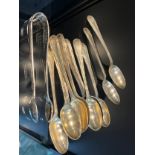 A Set of 11 Victorian London silver tea spoons and a matching set of sugar tongs. [172.81Grams]