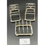 A Lot of three London silver small toast racks. Produced by James Aitchison. [7x7x5cm] [126.63grams]