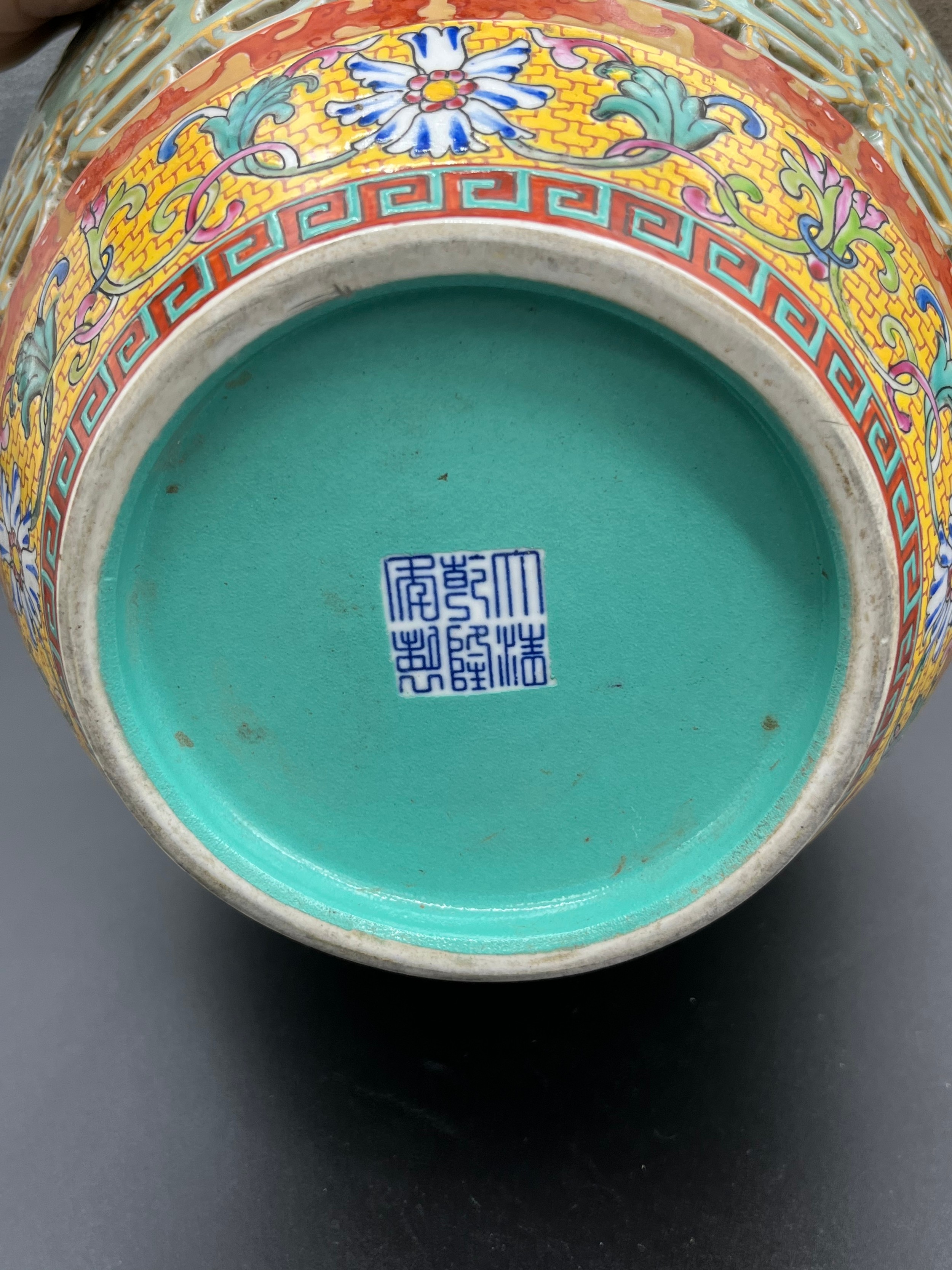 A Chinese Qianlong era marked vase. Yellow ground and pierced blue ground, Four panels depicting - Image 13 of 18