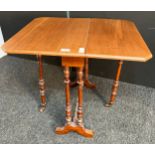 Sutherland drop end table, the D shaped top with drop end raised on turned legs and ending in